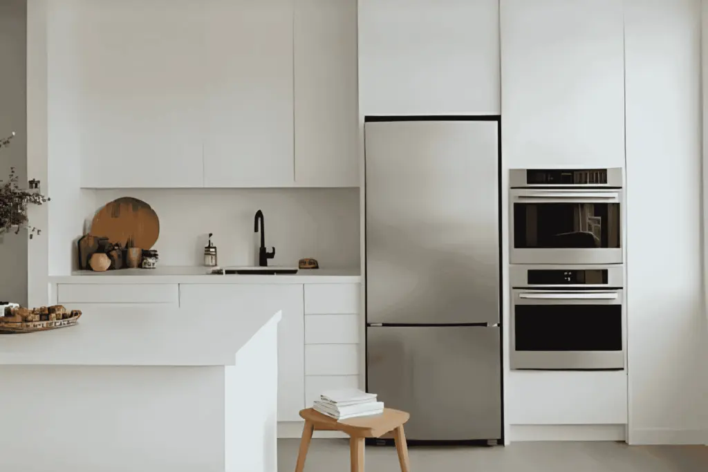 Appliance lifespan: a kitchen with a refrigerator and wall ovens