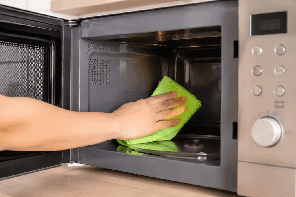 Wiping the inside of a microwave